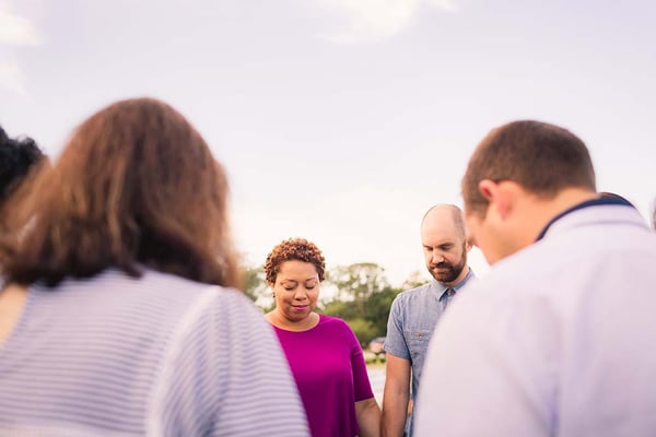 Group of people praying