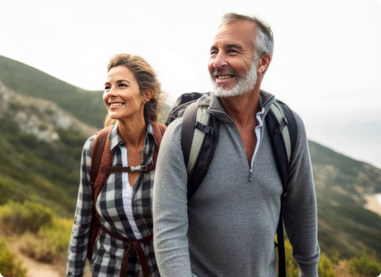 Husband and wife over the age of 65 enjoying a hike knowing their health care sharing community will be there for them.
