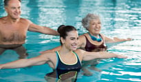 people exercising in a pool